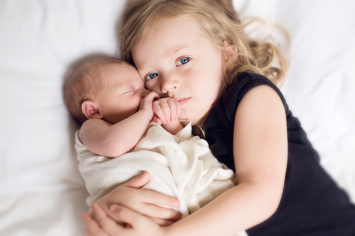 newborn and sibling professional portrait