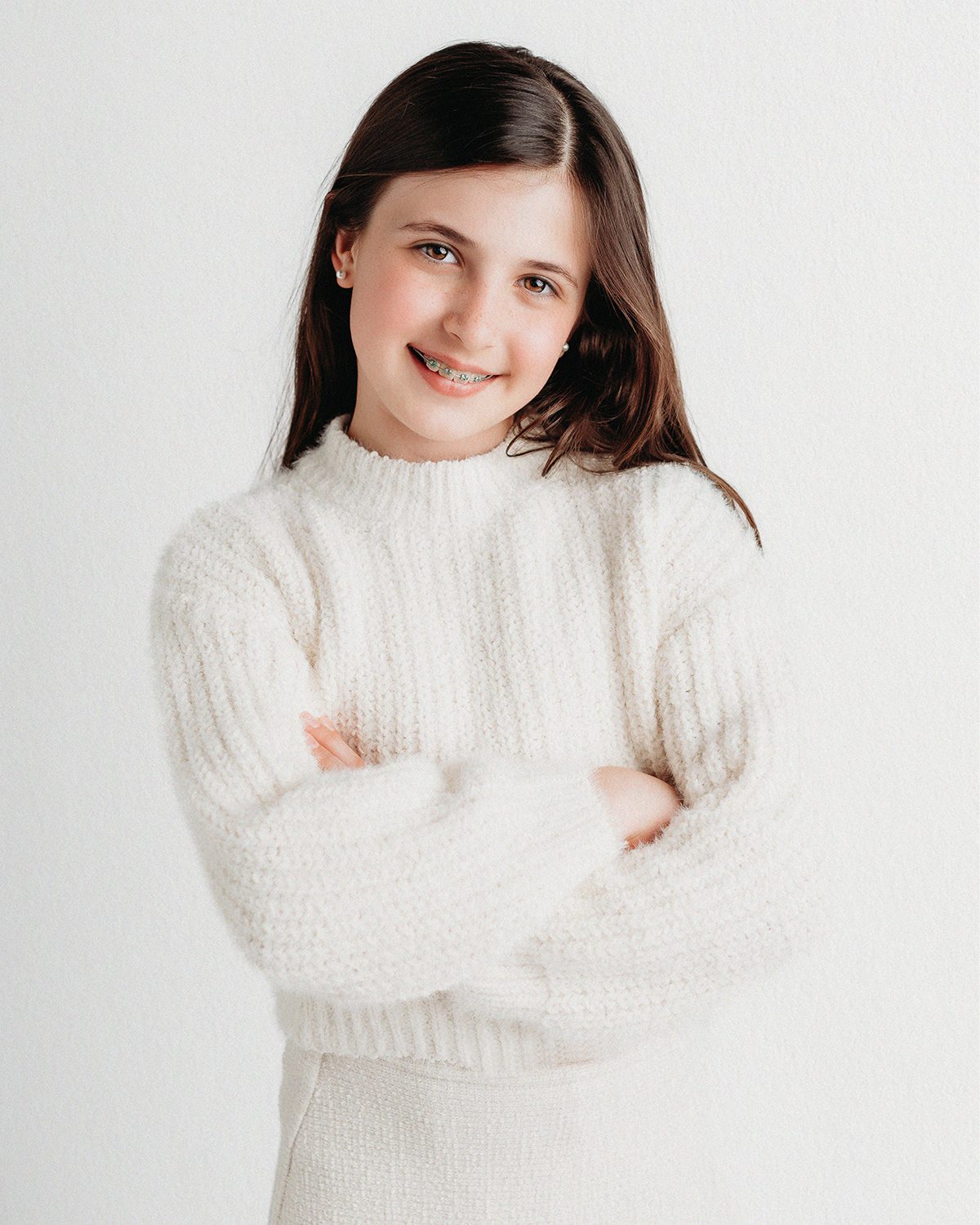 a studio portrait of a young girl taken by photographer Kelli Dease during a personality portrait mini session in Connecticut
