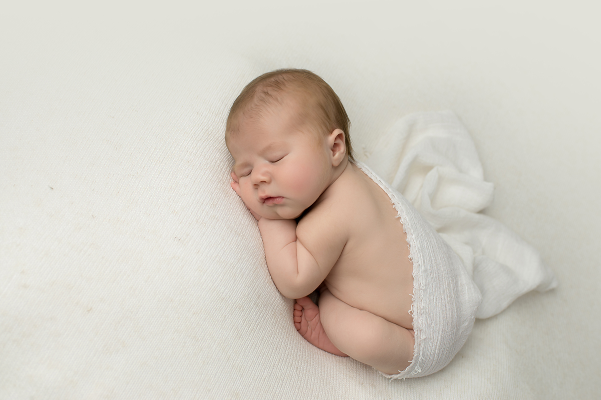 Pure baby photos. Naturally newborns. Prop free newborn photos. CT photographer Kelli Dease.