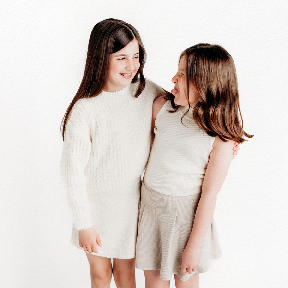 Farmington, CT children's personality portrait session. Minimalistic, light-filled studio portraits that highlight authentic expressions and childhood joy. Perfect for parents looking for timeless, personality-driven photography in Connecticut.