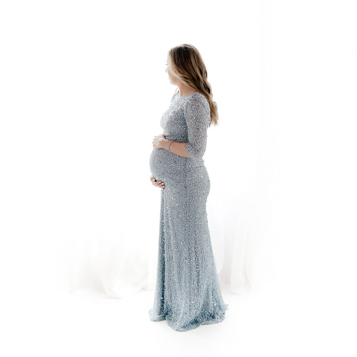 Indoor studio maternity photoshoot in Farmington, CT in a simple, light and airy style