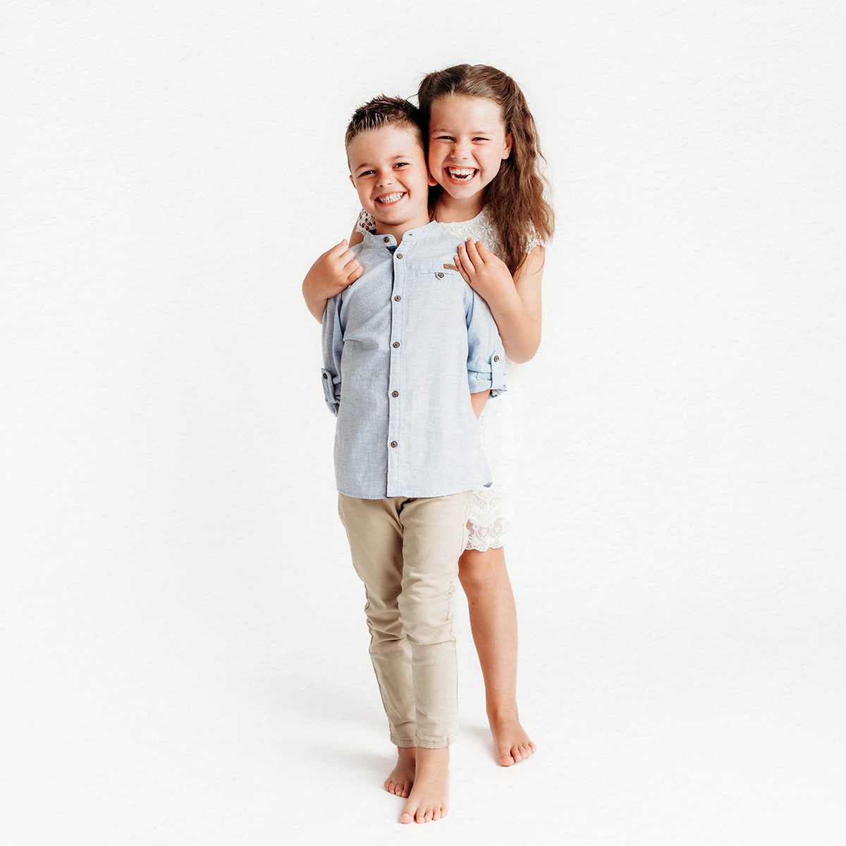 Farmington, CT children's personality portrait session. Minimalistic, light-filled studio portraits that highlight authentic expressions and childhood joy. Perfect for parents looking for timeless, personality-driven photography in Connecticut.