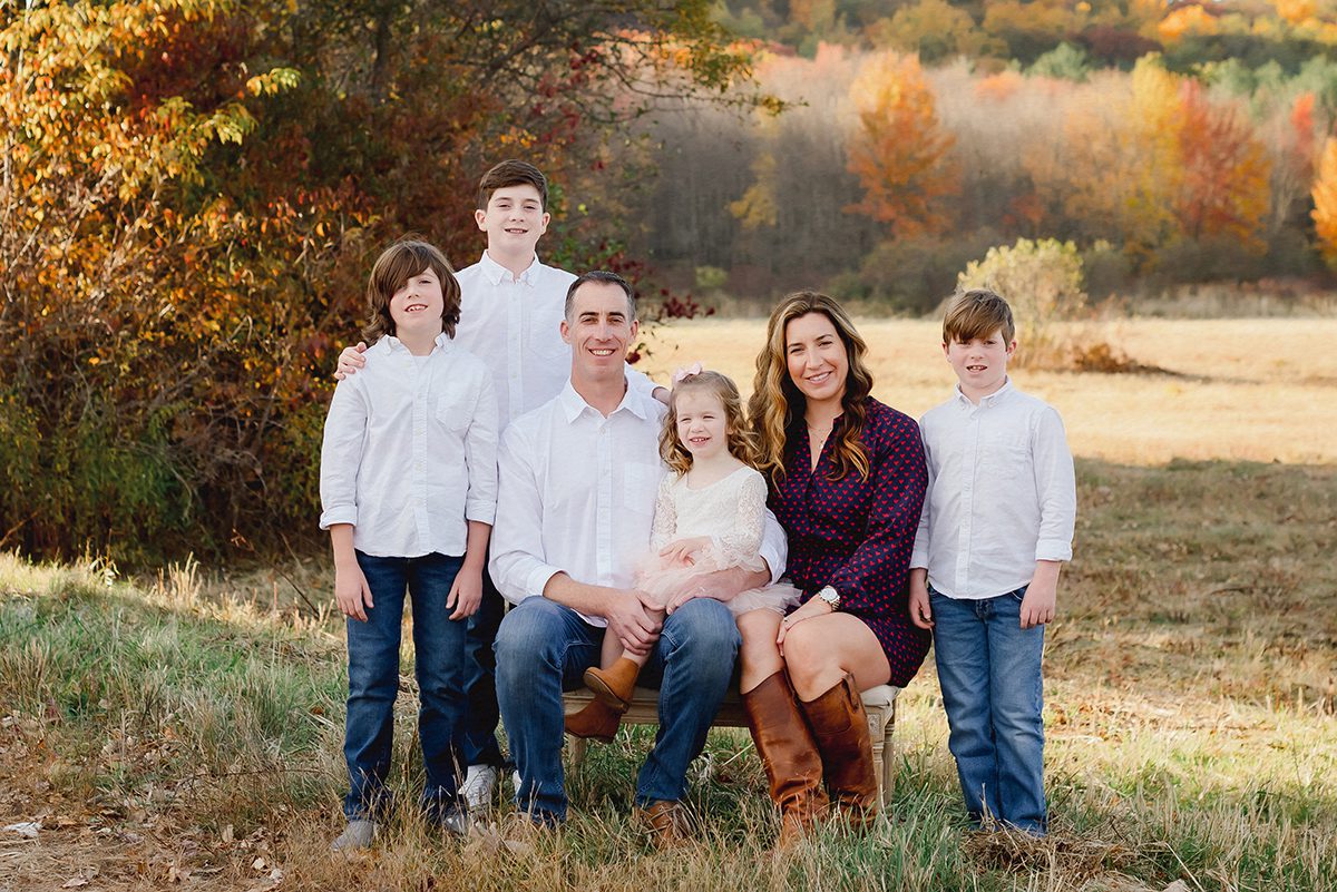 Classic white and denim outfit ideas for a fall family photoshoot in CT with teens and tweens.