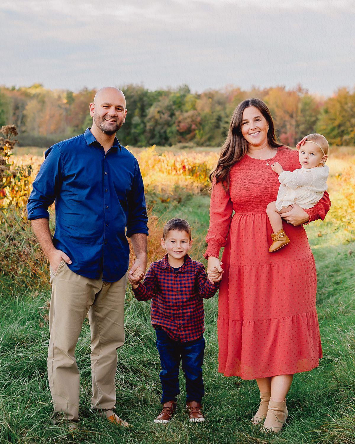 Rust-colored dress and warm fall outfits for family photos near West Hartford CT in early autumn.
