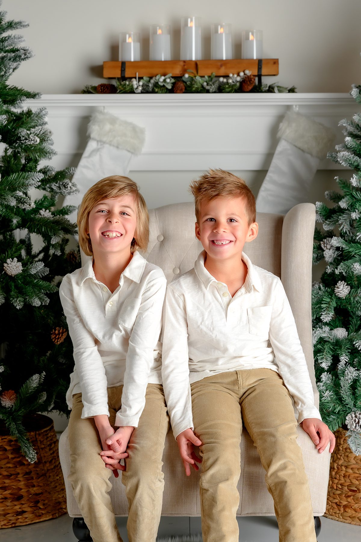 Siblings sitting for a traditional holiday portrait.