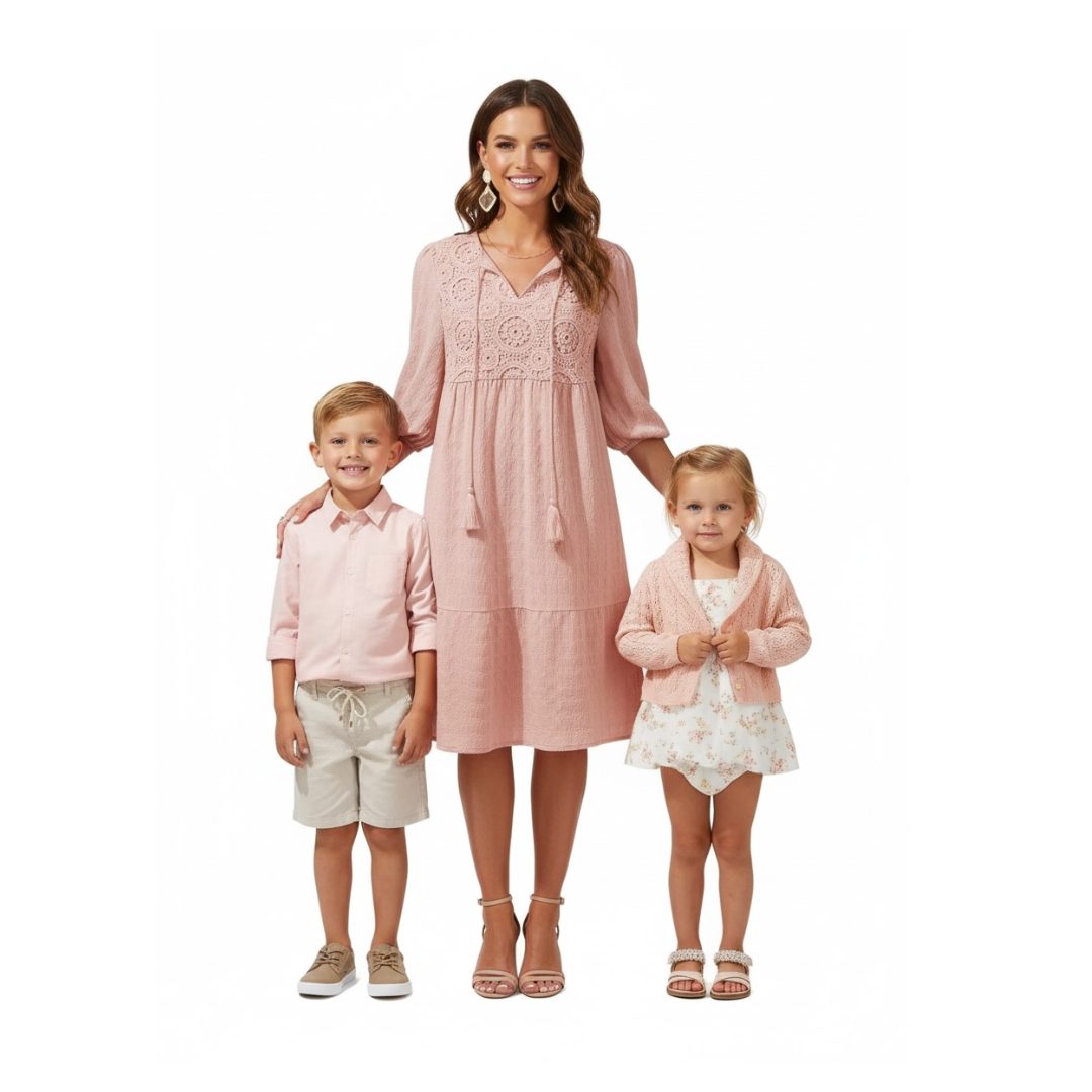 a mockup of a mother and her children wearing pink outfits for a motherhood photo session