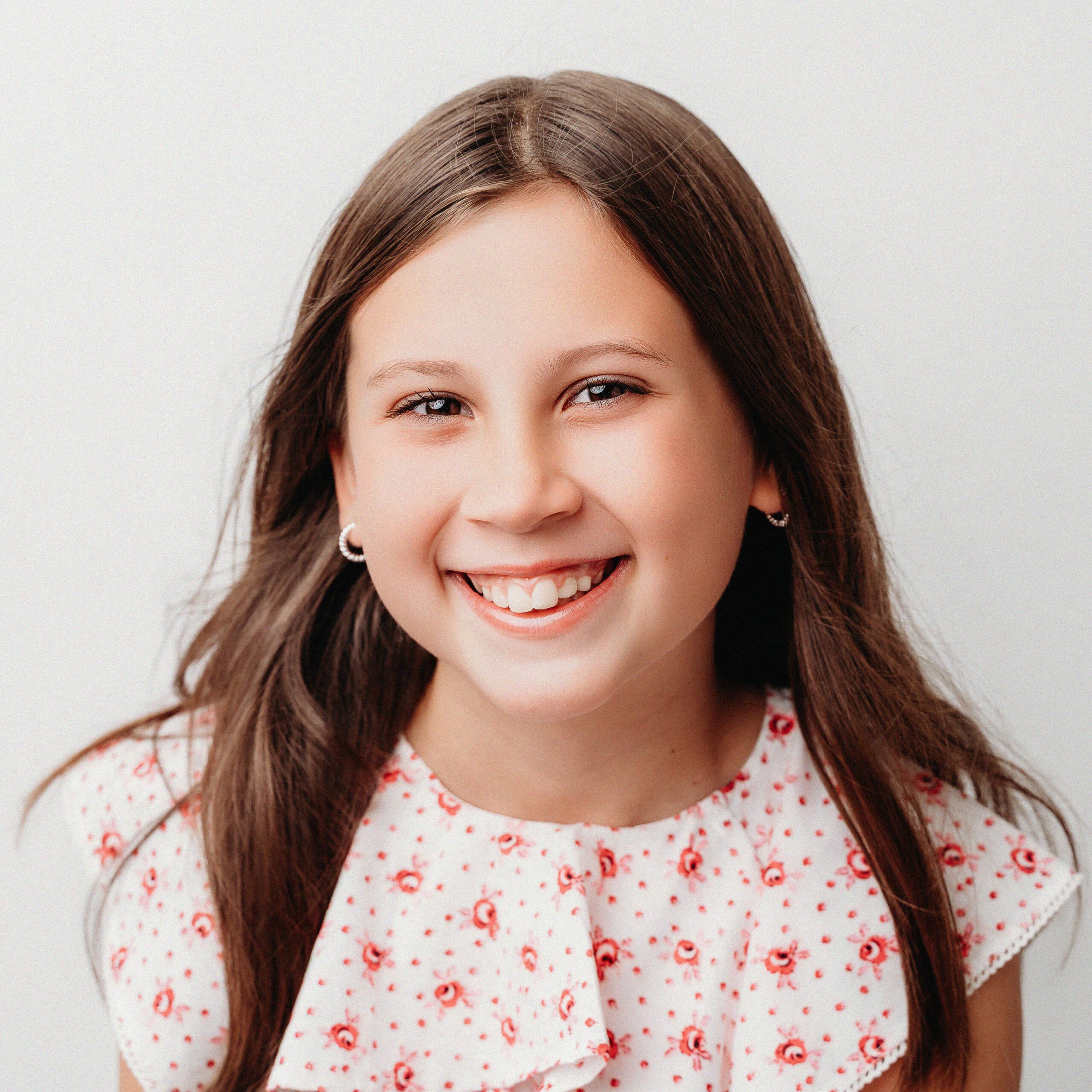 DAMN_15_WEB Preteen girl with long brown hair smiling during birthday portrait session at Kelli Dease Photography, Farmington Valley CT